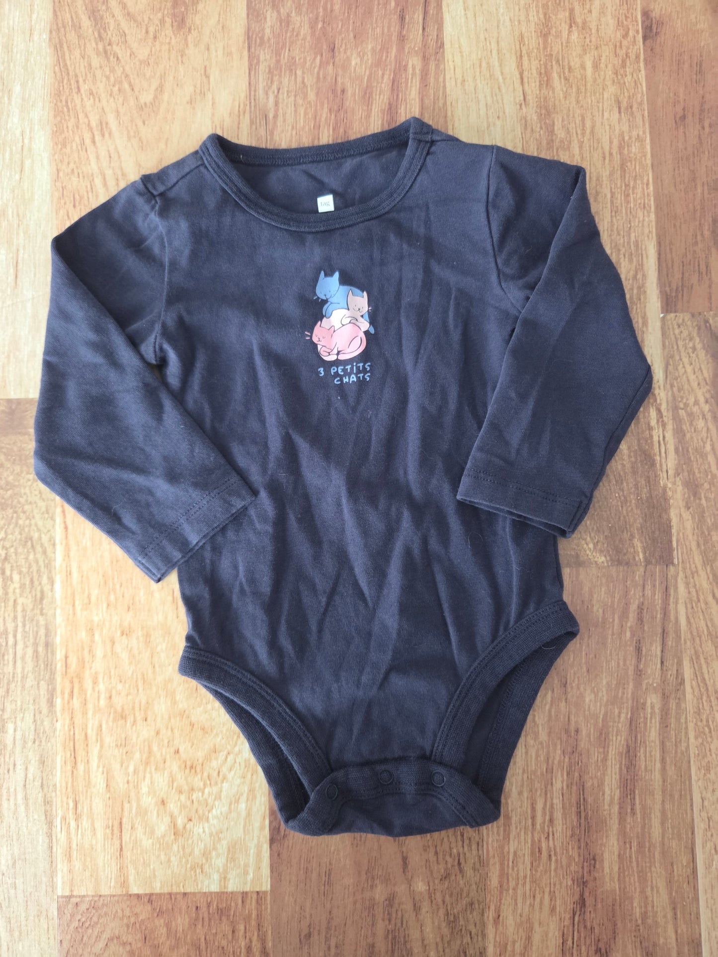 Cache-couche tag - 6 mois